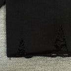 Long-sleeve sweater hem with subtle decorative knit trim