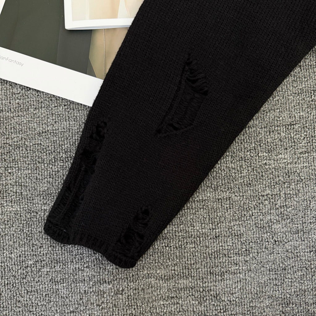 Long-sleeve sweater with decorative knit detail on sleeve cuff