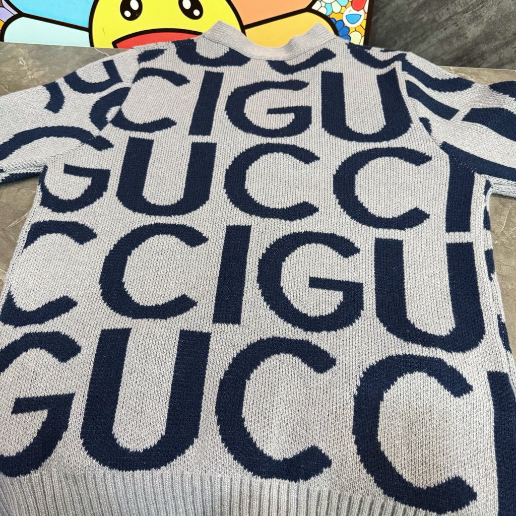 Gucci knit cardigan, allover dark blue GG pattern on white, crew-like neck with buttons