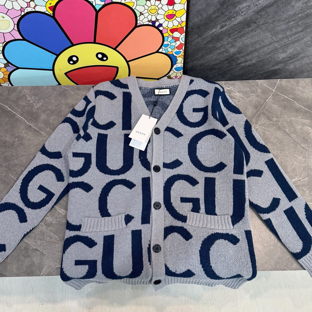 Kids' Gucci knit cardigan, white with dark blue GG jacquard, button front and ribbed hem