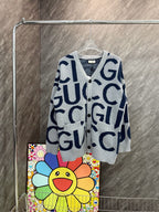 Kids cardigan sweater, light gray with navy Gucci-style logo pattern and button front