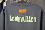 Louis Vuitton dark gray T-shirt back view with 'Louis Vuitton' text logo