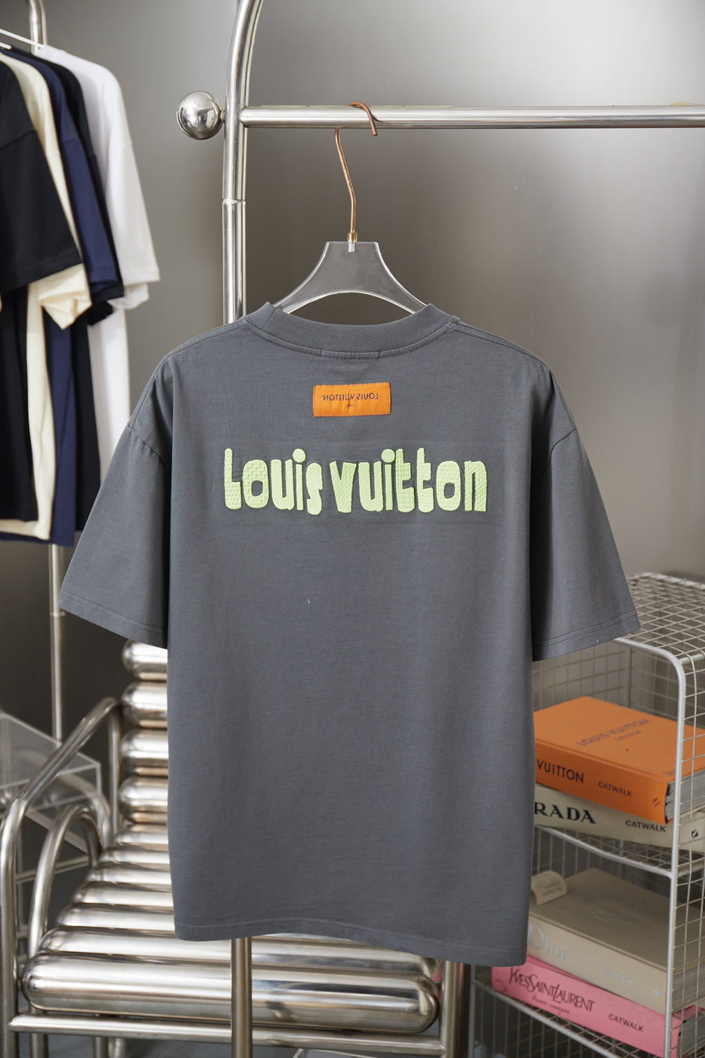 Louis Vuitton dark gray T-shirt with 'Louis Vuitton' text logo on back
