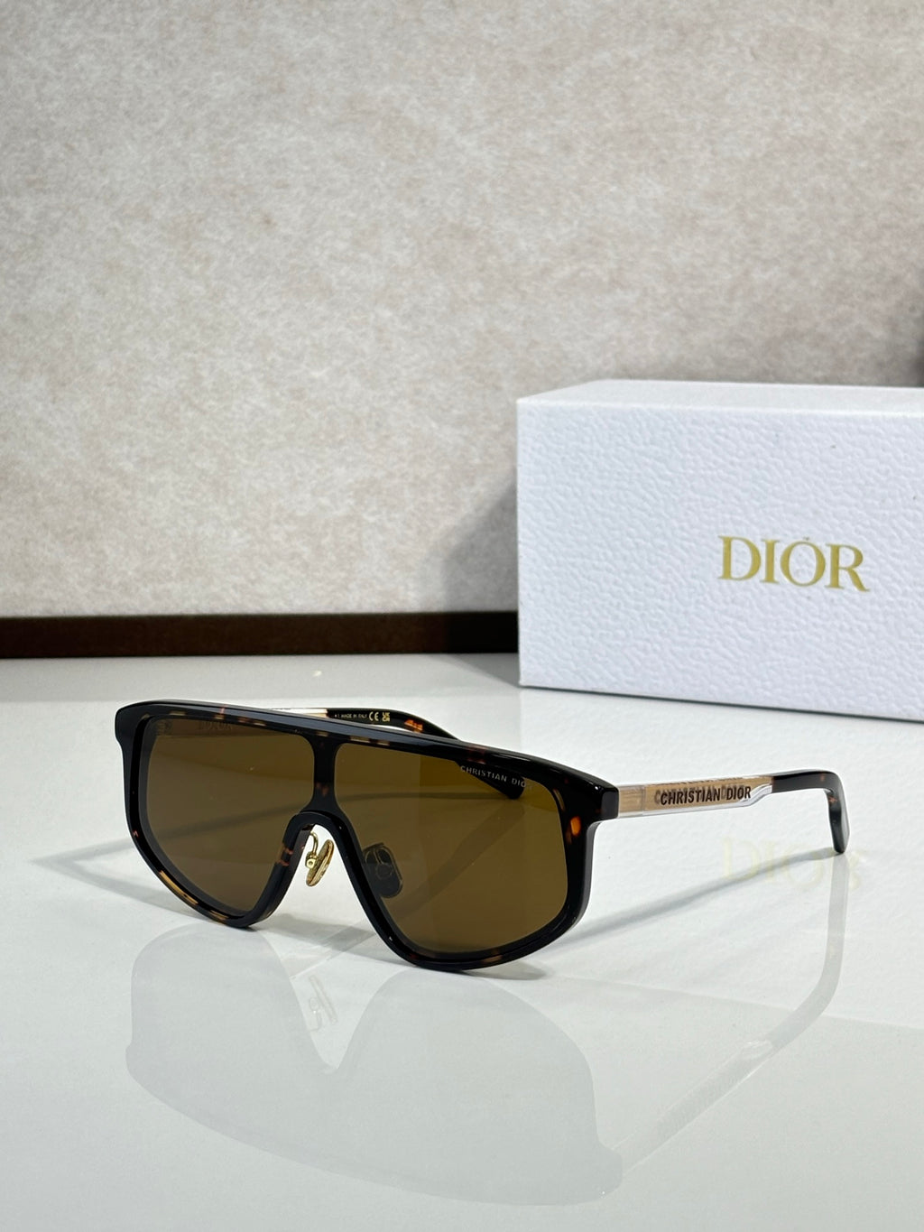 Dior sunglasses with black frame and brown-tinted lenses