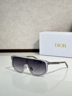 Dior sunglasses with gunmetal frame and dark tinted lenses