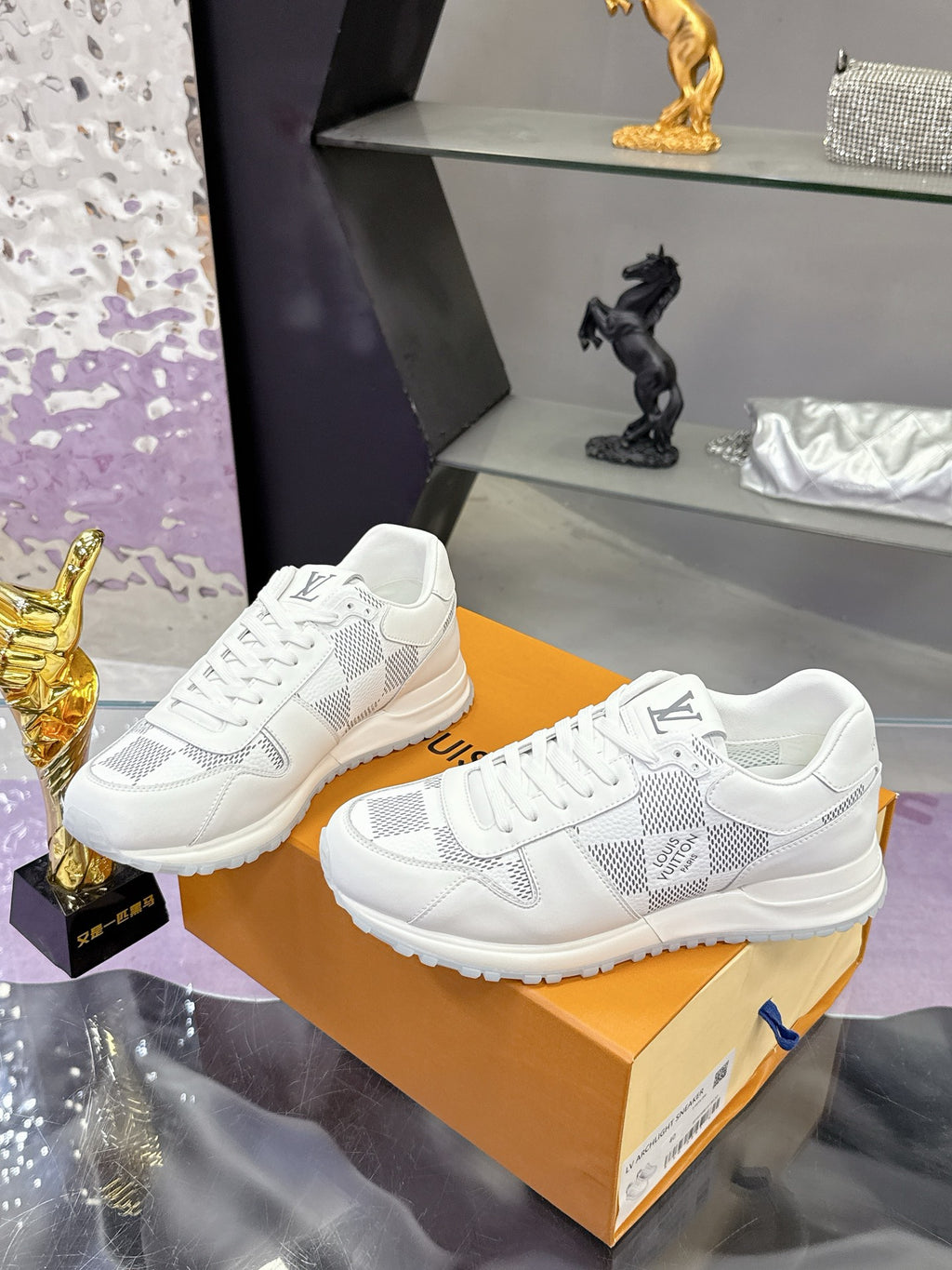 Louis Vuitton white lace-up sneakers with Damier-style logo print and thick rubber sole