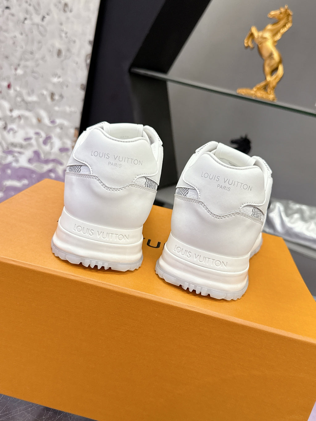Louis Vuitton white leather-look sneakers with embroidered back logo and chunky sole