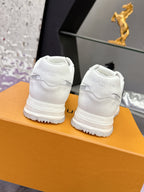 Louis Vuitton white leather-look sneakers with embroidered back logo and chunky sole