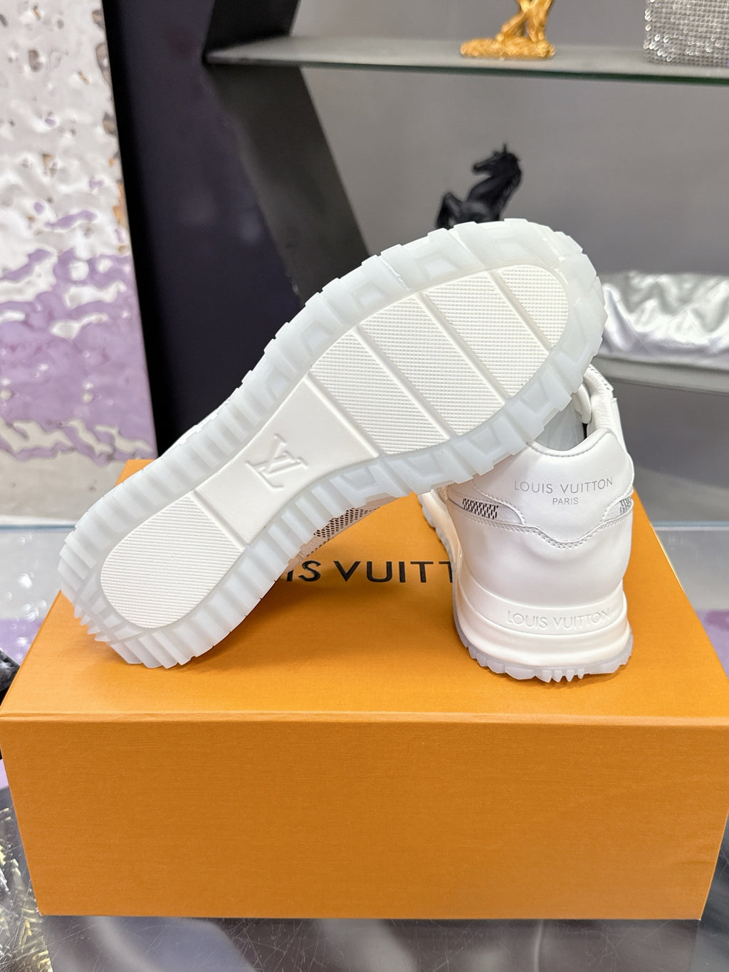 Louis Vuitton white sneaker outsole with tread and heel logo print