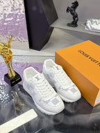 Louis Vuitton white lace-up sneakers with Damier-style logo print on tongue and sides