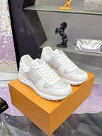 Louis Vuitton ladies white sneakers on orange box, lace-up with side logo panel