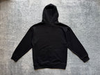 Stussy black zip-up hoodie back with drawstring hood and ribbed hem cuffs