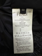 Clothing size label reading FENDI and sweater details
