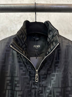 Black long-sleeve jacket with FENDI logo on chest and zip-up front, metal teeth