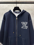 Navy Louis Vuitton zip-up hoodie with hood, LV logo patch, and dotted trim