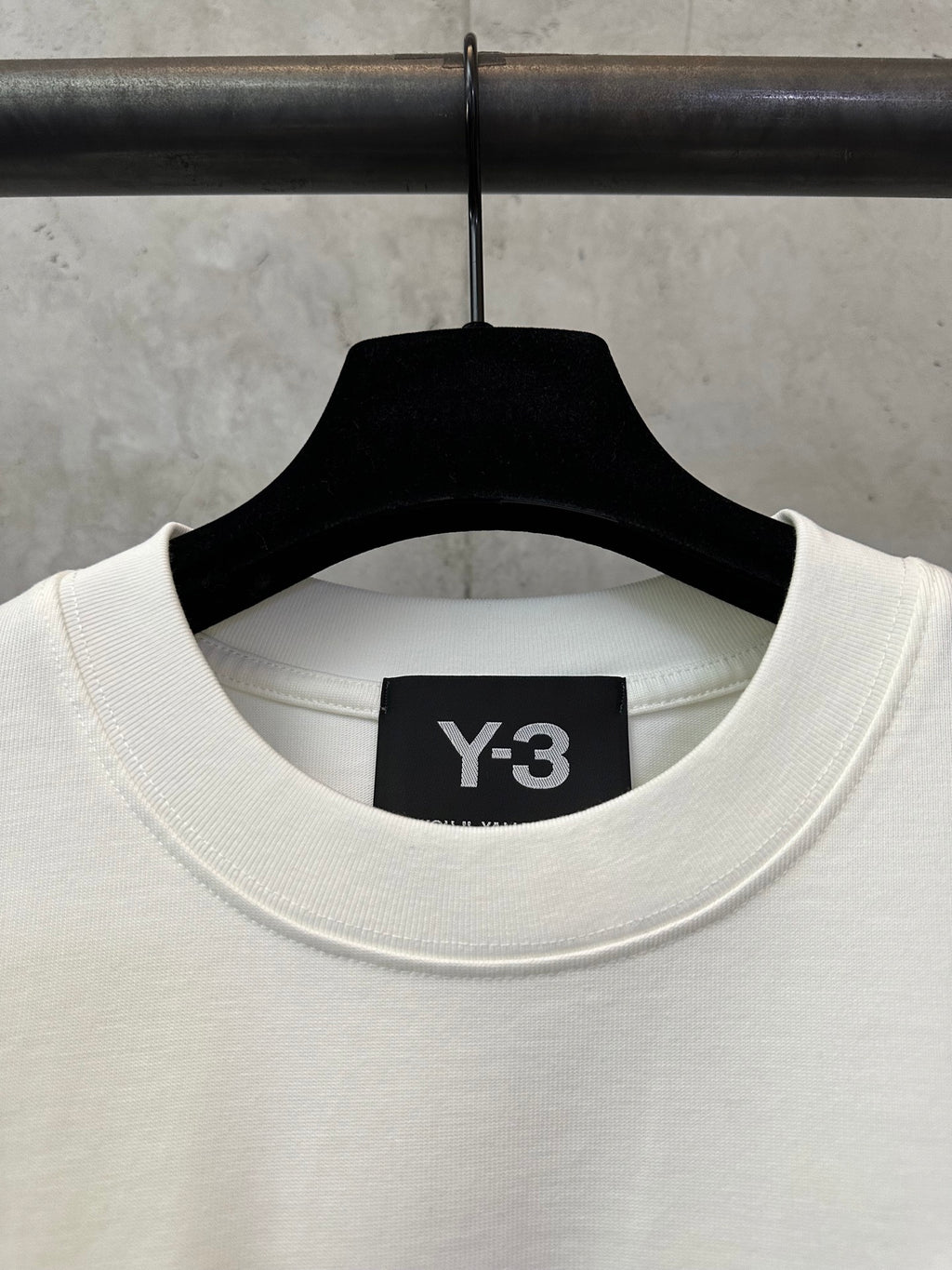 White Y-3 T-shirt collar closeup with Y-3 logo label
