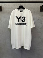 White Y-3 Neighborhood T-shirt on hanger, crew neck, short sleeves, front graphic print