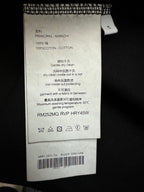 Amiri T-shirt care label, 100% cotton, dry clean inside net