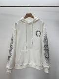 White pullover hoodie with hood and drawstring; front pocket; printed sleeve graphics