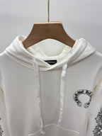 White hoodie with adjustable hood drawstrings; small chest logo graphic