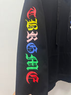 Black hoodie sleeve with colorful vertical letters graphic