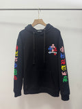 Black long-sleeve hoodie with front kangaroo pocket and colorful sleeve graphic