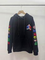 Black long-sleeve hoodie with front kangaroo pocket and colorful sleeve graphic