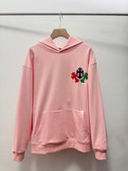 Pink long-sleeve hoodie with hood, front pouch pocket, and multicolor floral embroidery