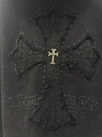Dark hoodie back embroidery: large cross applique with gold emblem at the center.