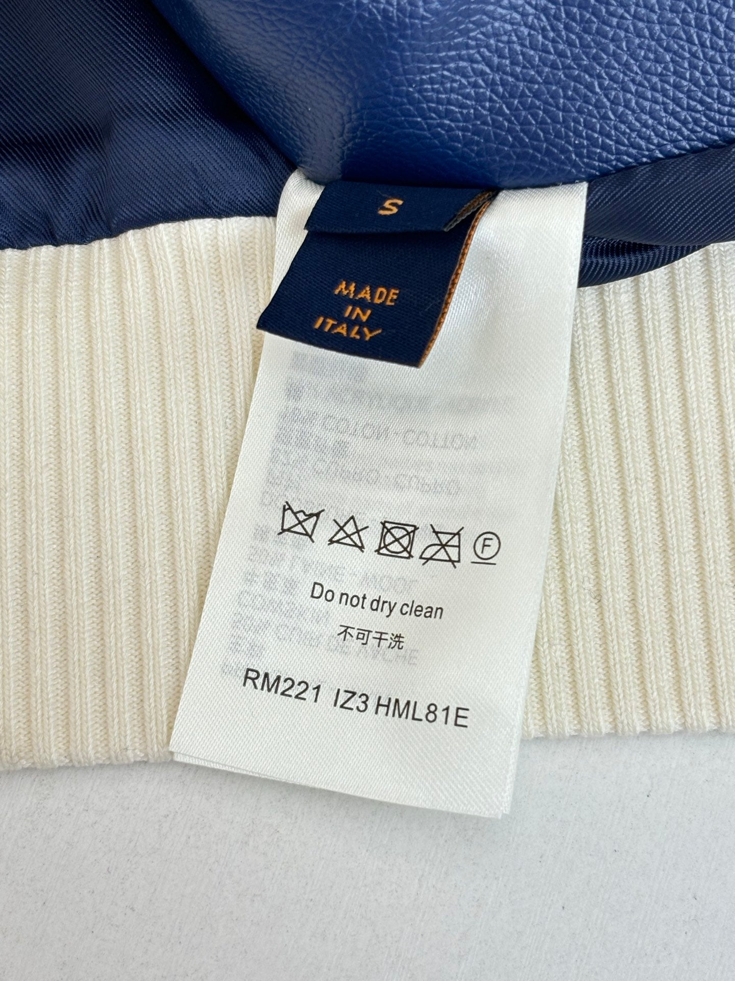 Louis Vuitton long jacket care label with size and wash instructions