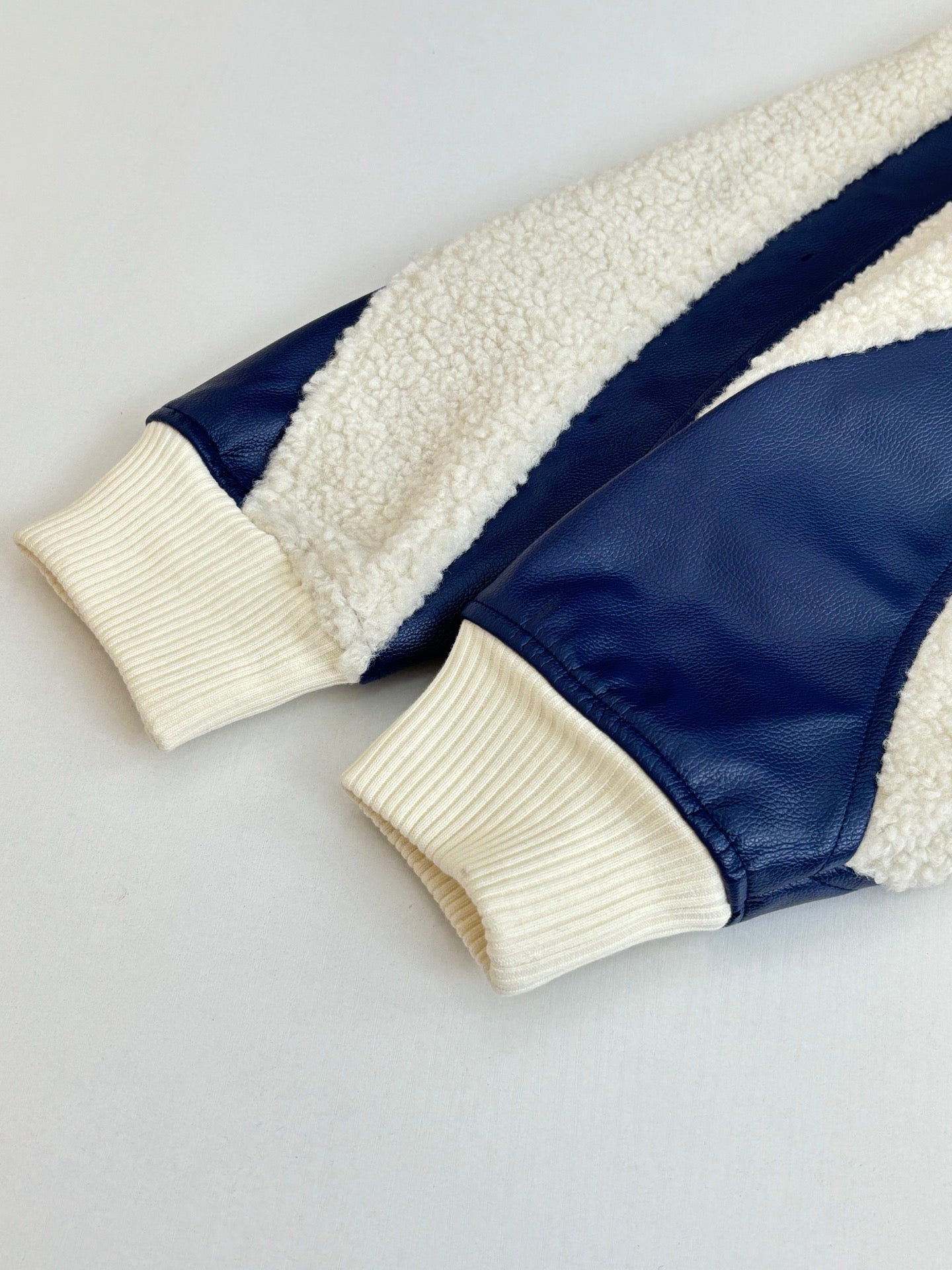 Louis Vuitton long jacket with blue leather and cream sherpa trim, ribbed cuffs