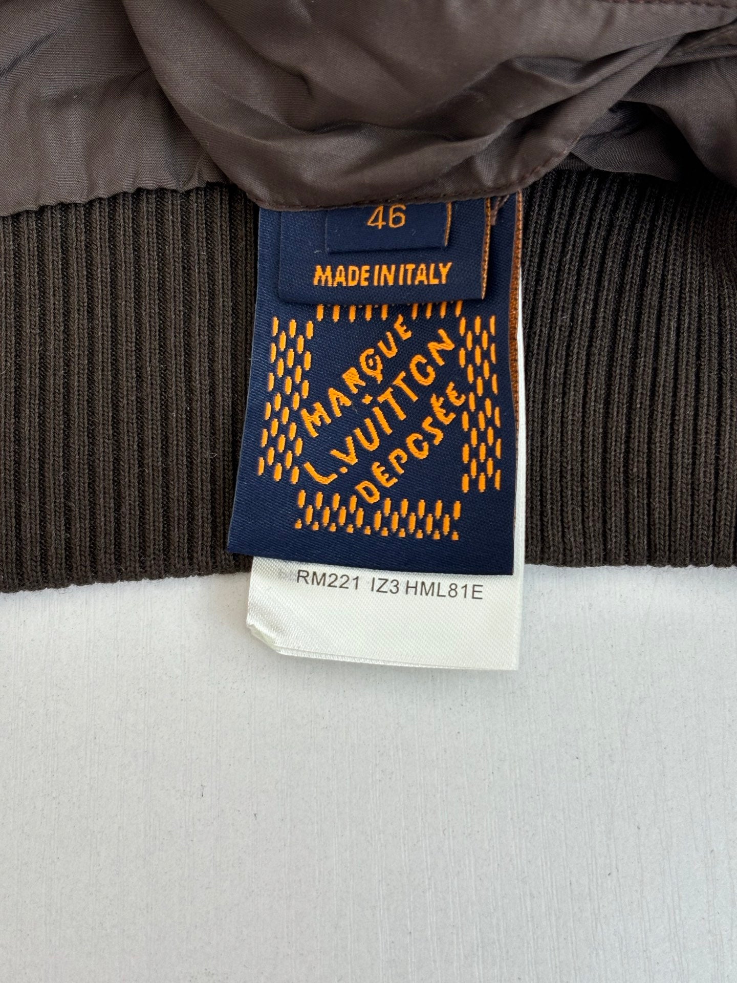 Long ribbed knit garment with made in Italy size label
