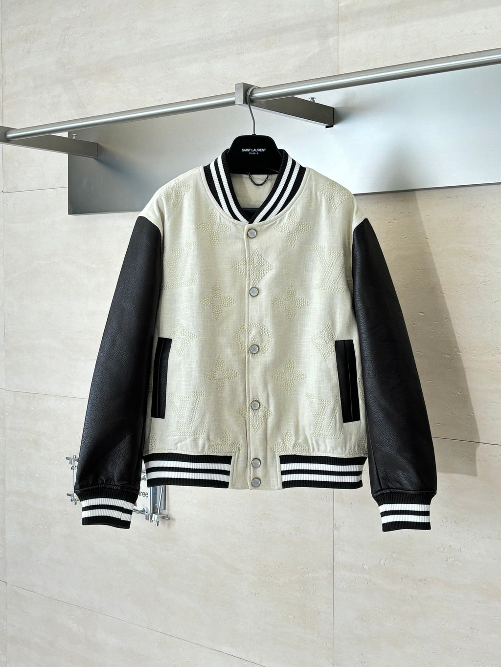 Louis Vuitton varsity jacket, cream body, black sleeves, striped ribbed collar and cuffs