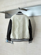 Louis Vuitton varsity jacket, cream back with striped ribbed hem and black sleeves