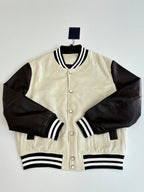 Louis Vuitton varsity jacket, cream textured body, black sleeves, button front, striped ribbing