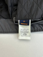 Long jacket interior label showing size 40 and Made in Italy
