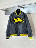 Louis Vuitton bomber jacket in dark gray with yellow logo and ribbed striped cuffs