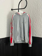 Louis Vuitton gray zip-up hoodie with red sleeve stripes and gold drawstrings