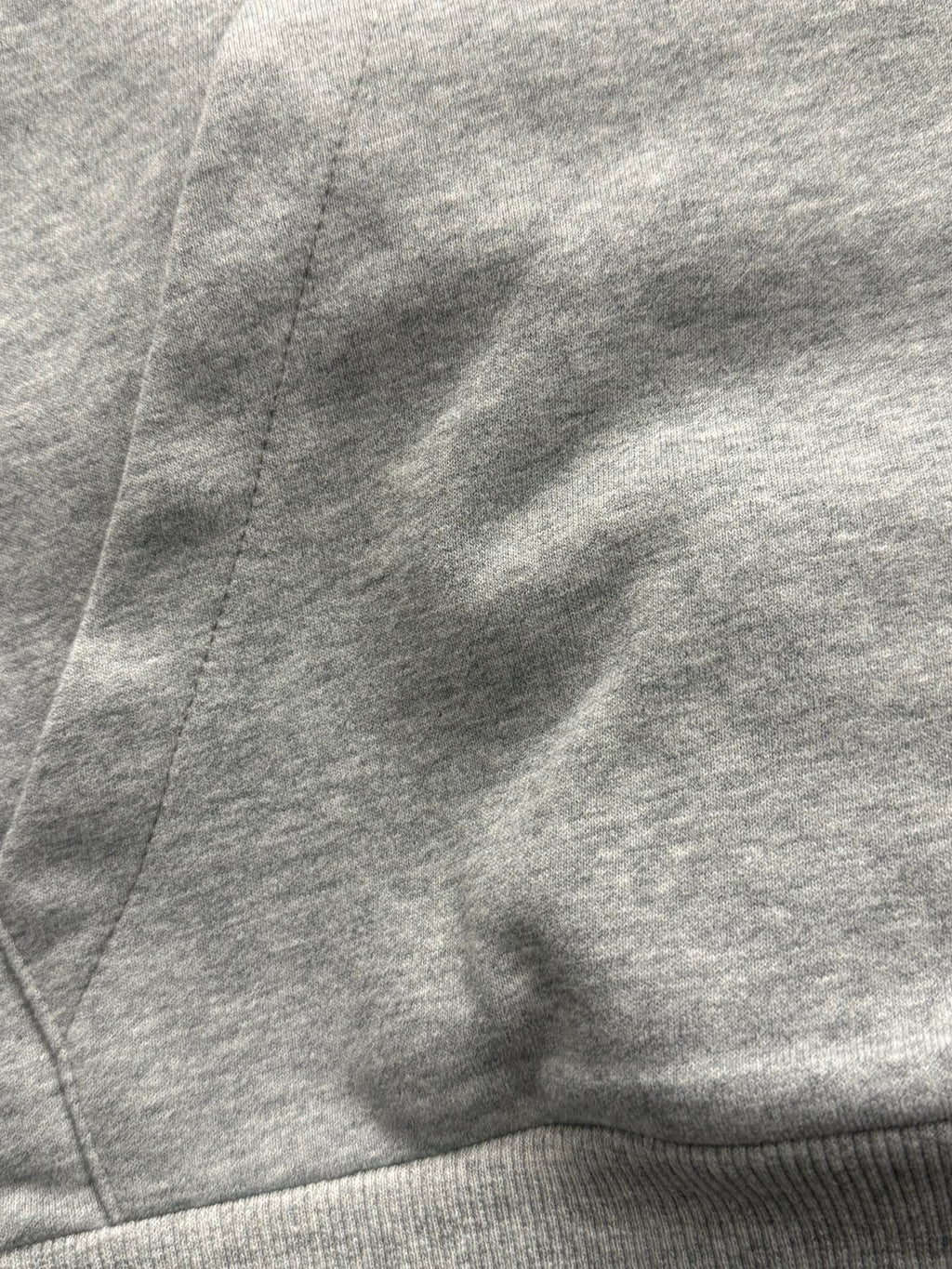 Gray hoodie hood and seam detail