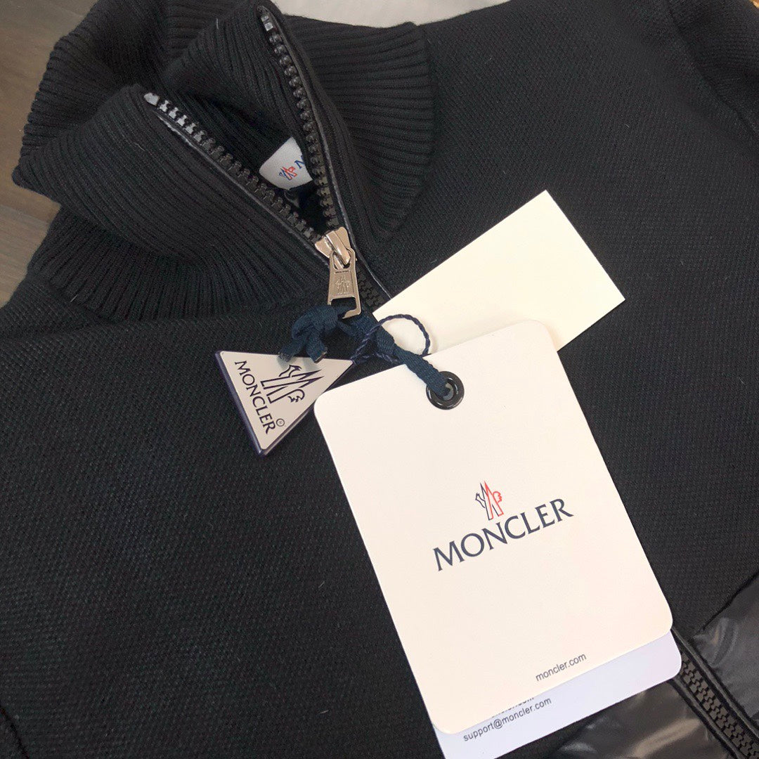Moncler ribbed knit zip sweater with attached tags and navy sleeve stripe