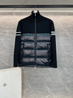 Moncler puffer jacket with quilted front, knit sleeves, and full-zip stand collar