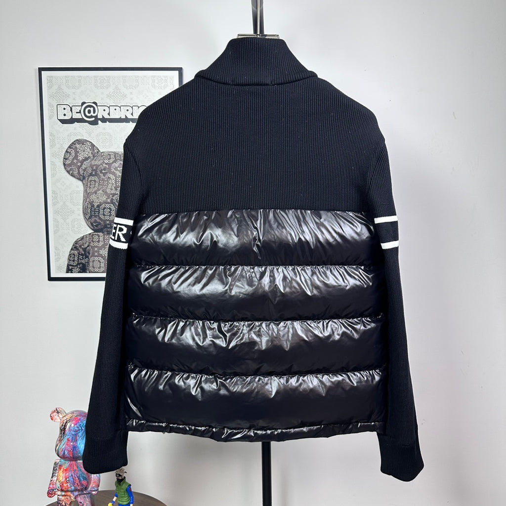 Moncler down puffer jacket back view with horizontal quilting and knit stand collar
