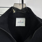 Moncler down puffer jacket neckline with knit collar and interior brand label