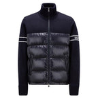 Moncler puffer jacket front view with ribbed knit cuffs, stand collar, and zipper