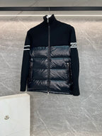 Moncler zip-up puffer jacket with quilted paneling and ribbed knit sleeves