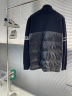Moncler puffer jacket back view with navy knit upper and shiny black quilted lower
