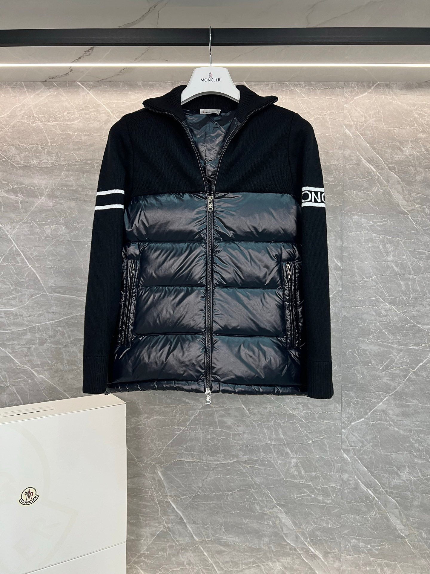Moncler puffer jacket with contrast quilted midsection and black knit collar