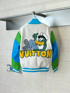 Louis Vuitton button-up jacket, back view, cream with cartoon graphic and blue ribbed hem