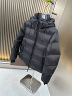 Burberry long padded hooded jacket with front zipper and quilted panels, dark navy
