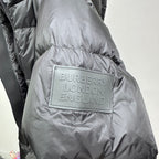 Long puffer jacket with Burberry London England logo patch, dark gray
